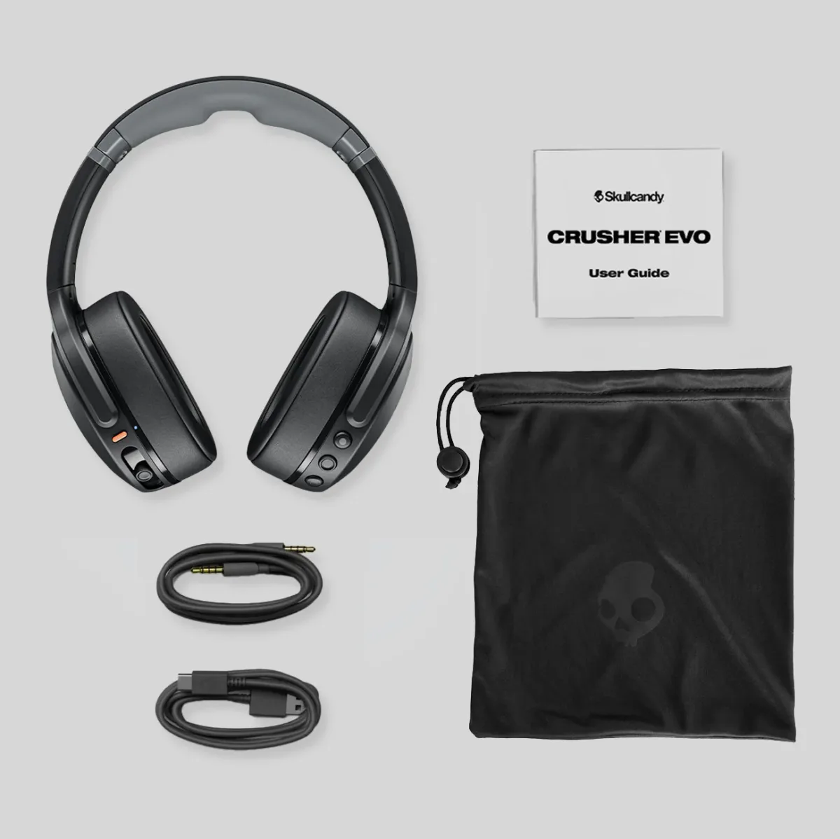 Skullcandy Crusher Evo full kit: headphones, cables, drawstring bag, and user guide